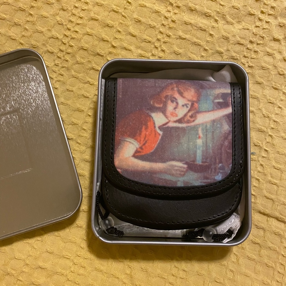 Taxi brand “Nancy Drew” wallet